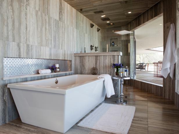 Gray Bathroom With Large Window, Metallic Tile Niche, and Stone Tiles