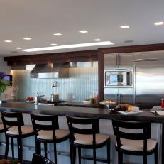 Contemporary Kitchen With Long Island and Bar Seating