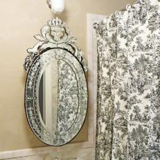 Neutral Bathroom With Ornate Oval Mirror