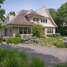 English Country Home Exterior with Purple Hydrangeas