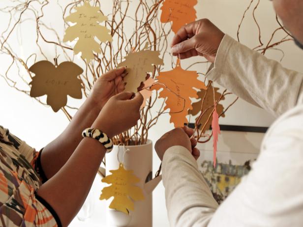 As guests finish their messages, instruct them to tie them onto the tree so everyone can enjoy them. Tip: Curly willow branches have been dried, so no water is needed to keep them alive.