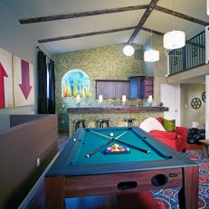 Game Room With Bar and Vaulted Ceiling