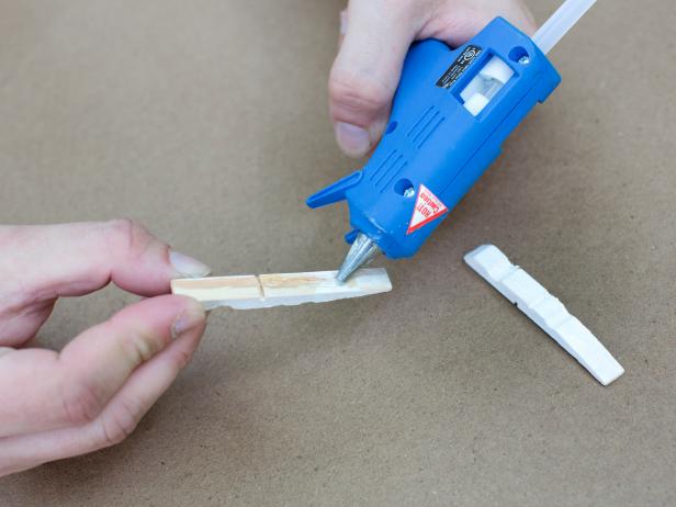 Add hot glue to the clothespins' unpainted backs.