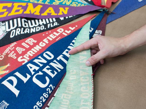 Line up pennants and make sure they overlap slightly before stitching them into your tree skirt.