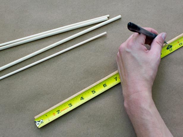 Use a tape measure and pen or marker to mark each 3/8&quot; thickness dowel at 12 inches in length.