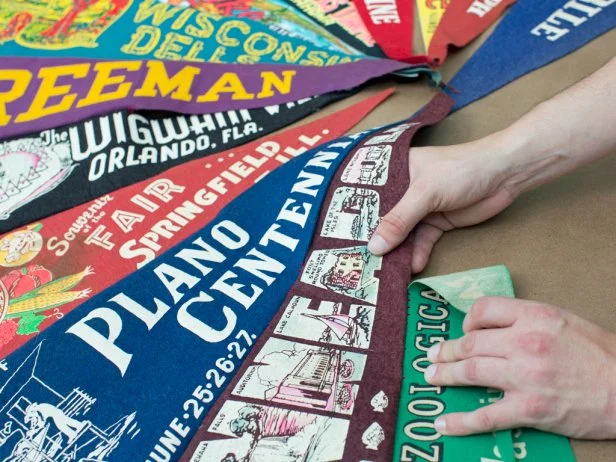 Once every two pennants are stitched together, be sure to check for a straight overlapping edge before beginning the next two pennants.