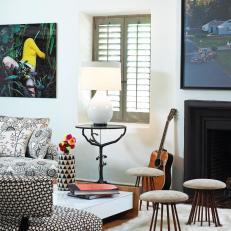 Eclectic Living Room With Black and White Patterned Seating