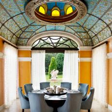 Dining Room With Ornate Ceiling