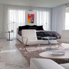 Modern White Studio With Black-Fur Bedspread