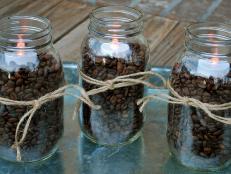 Coffee beans and tea lights in jars