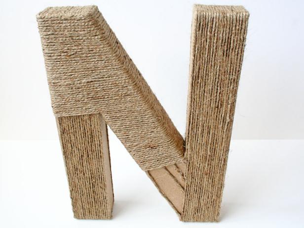 Continue the process of covering your letter with jute.