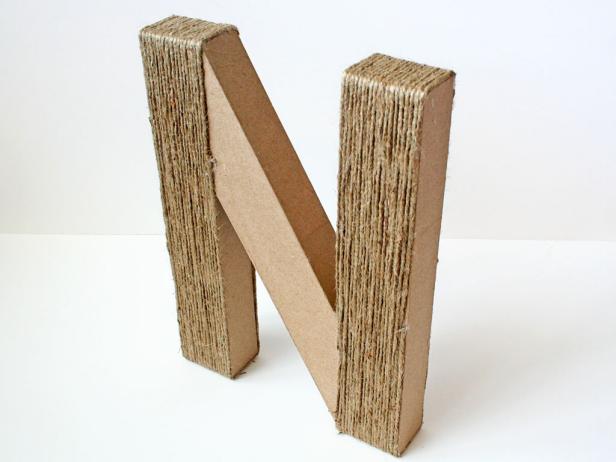 Cover both stems of the N with jute first.