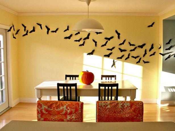 Yellow Dining Room With Flying Bat Halloween Wall Decor