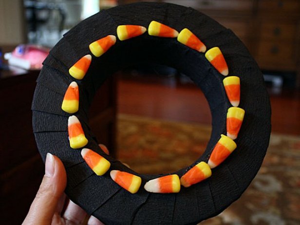 Black wreath with candy corns glued on