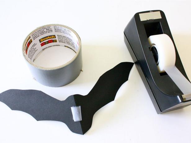 Black paper bat and scotch tape