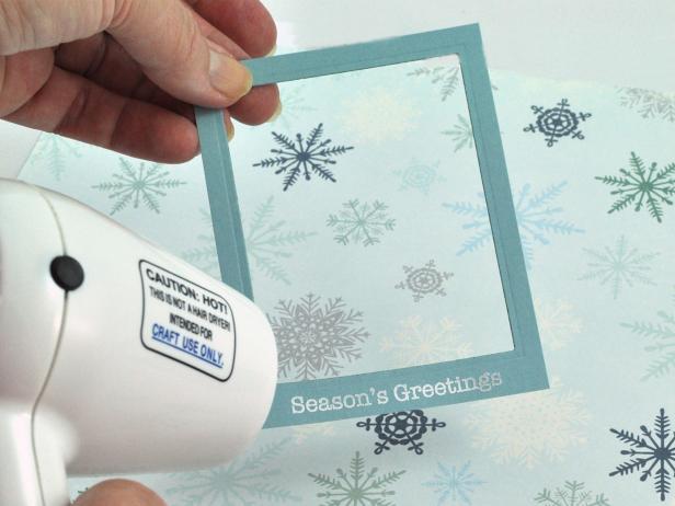 Using a heat tool, heat embossing powder until it melts on the message you choose for the card. Note: Alternately, stamp sentiment in white pigment ink.