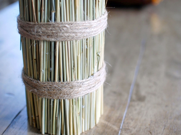 To finish your centerpiece, wrap twine around the base of the wheat bundle. Secure with a small amount of glue, then display. This look fits in perfectly with fall decor.