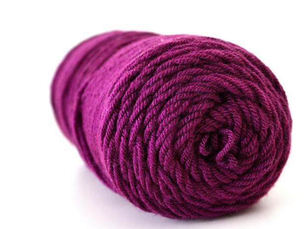Double roll of purple yarn