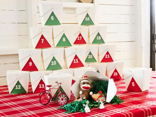 Stack boxes in the shape of two Christmas trees and open one daily until Christmas Day. (Helpful Hint: Use double-sided tape between each box to keep them from accidentally falling.)