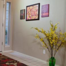 Calm, Neutral Entryway With Bright Yellow Flowers