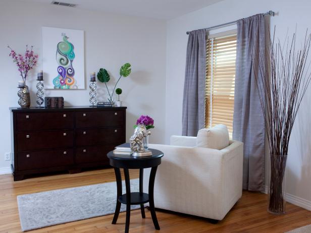 White Sitting Room With Dark Wood Dresser Hgtv