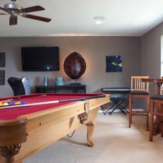 Gray Game Room With Wood Pool Table