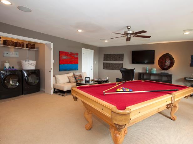 Transitional game room with red pool table and tuck away for Pool design game