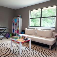 Kid's Playroom With Zebra-Print Rug