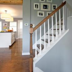 Contemporary Gray Entryway With Painted Staircase