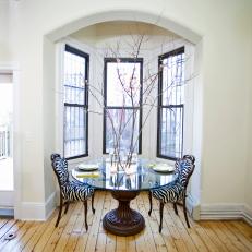 Modern Dining Nook With Zebra Print Chairs