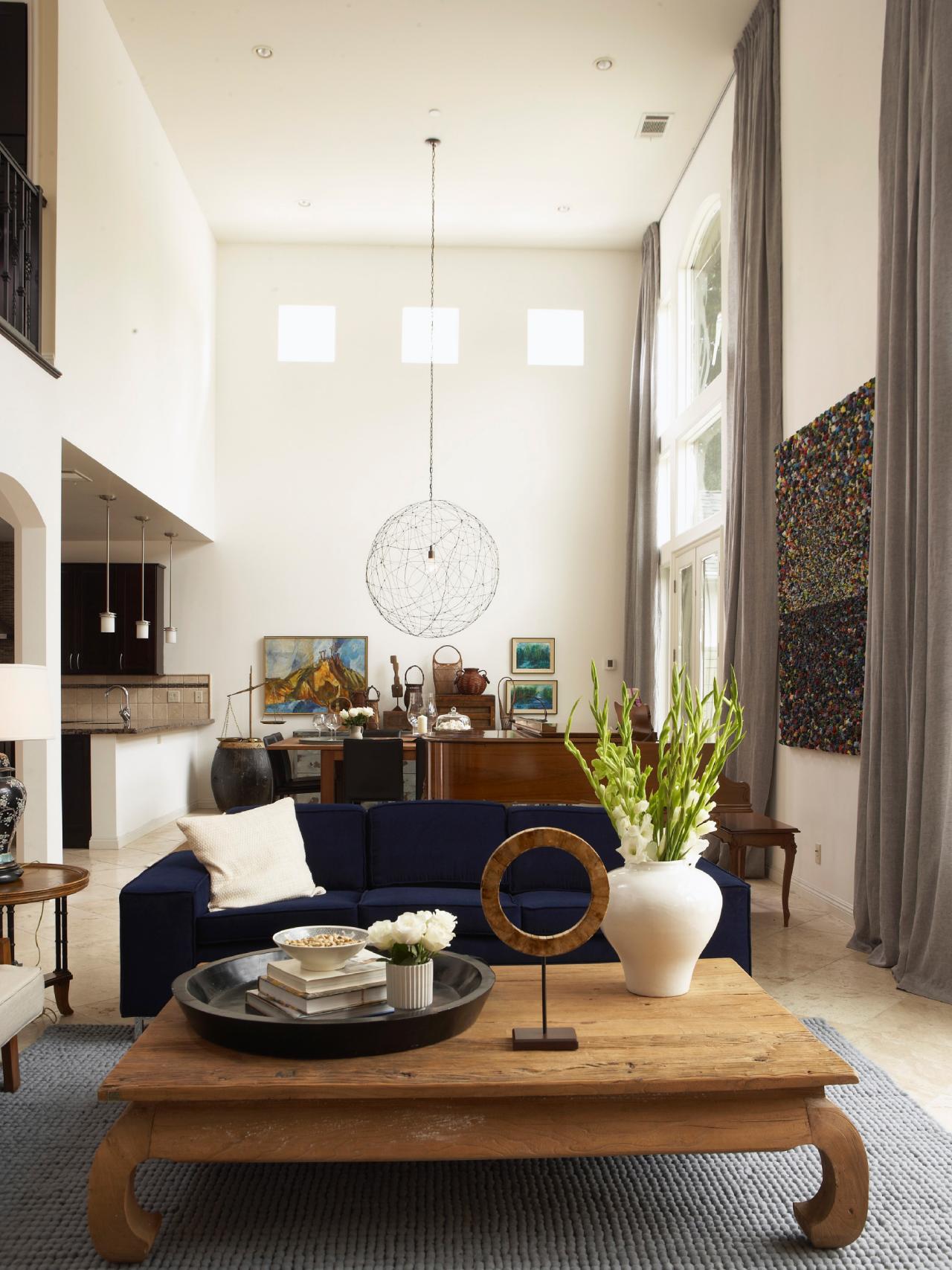 Contemporary Cream Living Room With High Ceilings And Blue