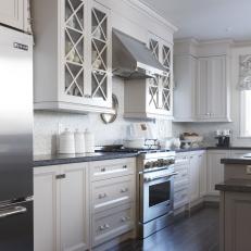 Classic Kitchen With Customized Cabinetry and Gray Countertops