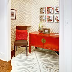 Eclectic Nook With Zebra-Print Walls and Rug