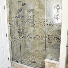Neutral Tile Shower With Bench in Traditional Bathroom