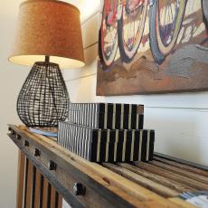 Rustic Console Table With Lamp and Art