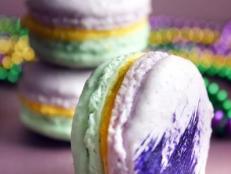 These colorful macarons are inspired by the Mardi Gras King Cake tradition. Be sure to let guests know that one cookie will have a baby surprise inside and that they'll have to make the Mardi Gras macarons next year.