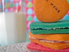 This Valentine's Day, swap chalky conversation heart candies for colorful (and delicious!) vanilla sandwich cookies stamped with custom messages.