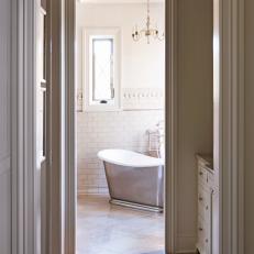 Traditional White Bathroom With Subway Tiles and Freestanding Tub 