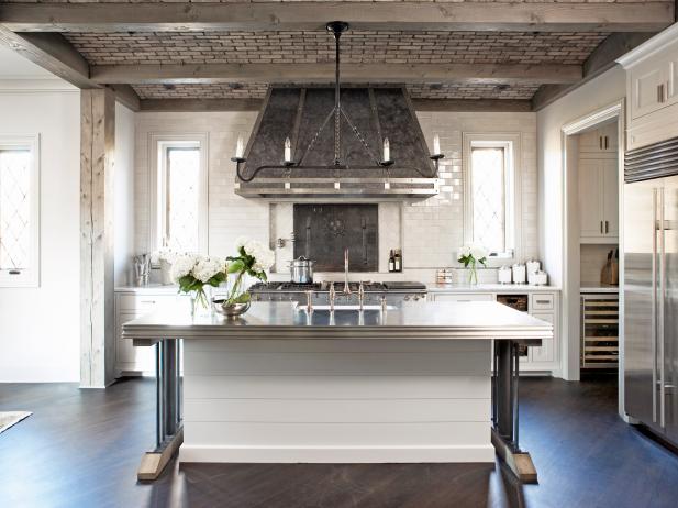White French Country Kitchen With Beamed Ceiling and Stainless Steel 