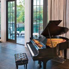 Traditional Neutral Music Room Leading to Private Terrace