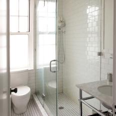 White Subway and Basket Weave Tile Shine in Classic Bathroom