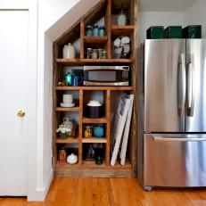 Rustic Wooden Storage Nook With Stainless Refrigerator