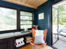 Window Seat and Butterfly Chair in Navy Living Room