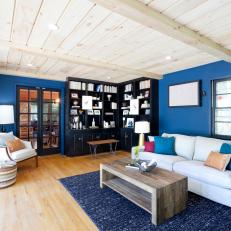 Vibrant Blue Living Room With Rustic Details