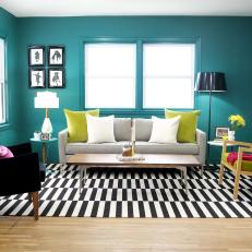 Teal Living Room With Black and White Rug