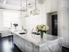 Traditional White Kitchen Featuring Floor-to-Ceiling Cabinets