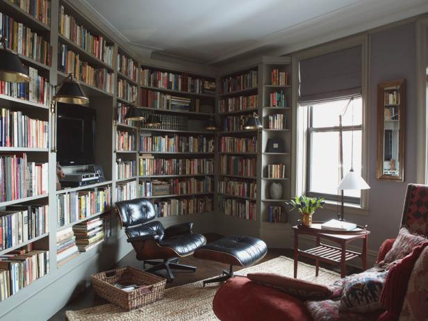 Library With Built-In Bookcases and Lounge Chair