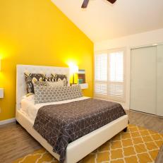 Contemporary Bedroom With Bright Yellow Accent Wall