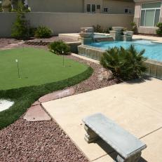 Private Putting Green Beside Backyard Pool