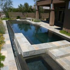 Modern Overflow Pool With Reflection Pond